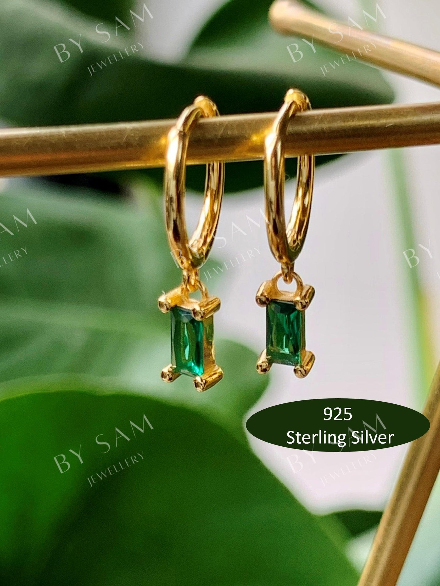 Emerald huggie earrings